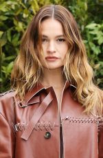LILY JAMES Arrives at  Tod