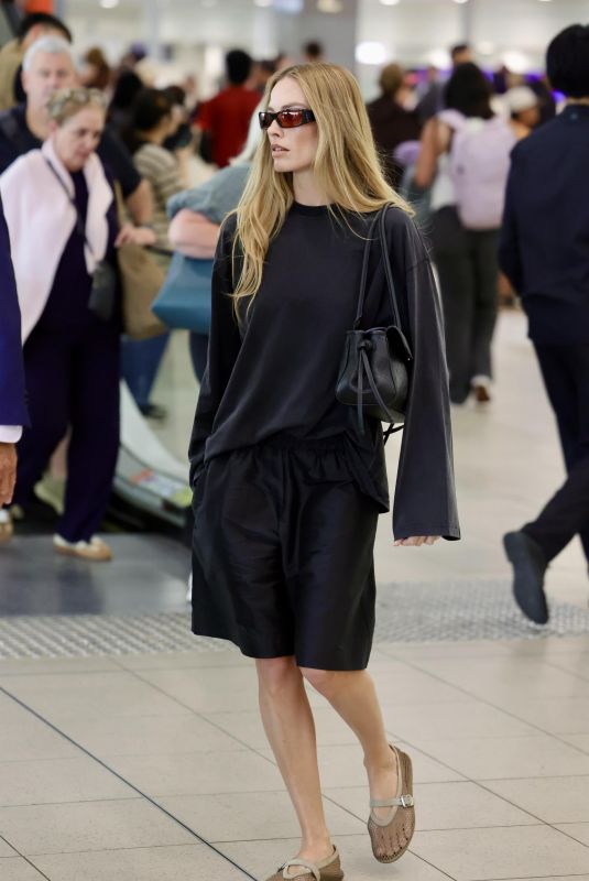 MARGOT ROBBIE Arrives at Sydney Airport 02/22/2026