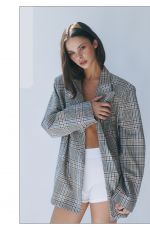 MEIKA WOOLARD at a Photoshoot, February 2026