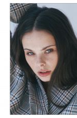 MEIKA WOOLARD at a Photoshoot, February 2026