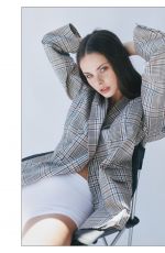 MEIKA WOOLARD at a Photoshoot, February 2026