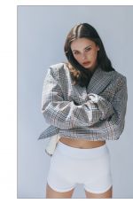 MEIKA WOOLARD at a Photoshoot, February 2026