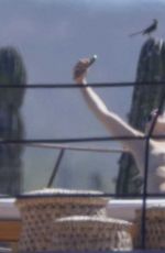 OLIVIA WILDE in Bikini at a Beach in Mexico 02/11/2026