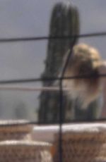 OLIVIA WILDE in Bikini at a Beach in Mexico 02/11/2026