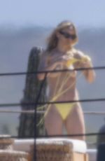 OLIVIA WILDE in Bikini at a Beach in Mexico 02/11/2026