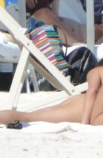 SOPHIE RAIN in Bikini at a Beach in Tulum 02/10/2026