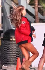 BROOKS NADER in a Red Swimsuit on the Set of Baywatch Reboot at Venice Beach 03/19/2026