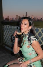DUA LIPA at a Photoshoot 03/19/2026