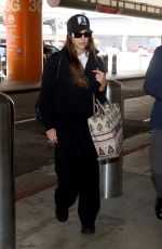 JESSICA ALBA Arrives at LAX Airport in Los Angeles 03/16/2026
