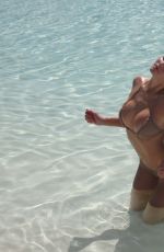 KYLIE JENNER in Bikini 03/28/2026