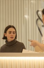 LILY COLLINS Leaves Keren Bartov Skin Studio in London 02/25/2026