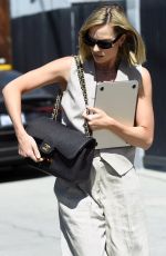 MARGOT ROBBIE Arrives at Her Office in Los Angeles 03/19/2026