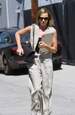 MARGOT ROBBIE Arrives at Her Office in Los Angeles 03/19/2026