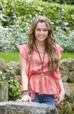 MILEY CYRUS at Hannah Montana: The Movie Photocall in Rome 04/20/2009