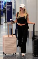 OLIVIA DUNNE Catches a Flight Out of LAX 03/10/2026