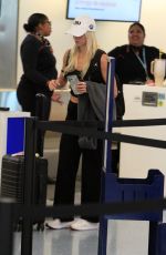 OLIVIA DUNNE Catches a Flight Out of LAX 03/10/2026