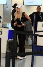 OLIVIA DUNNE Catches a Flight Out of LAX 03/10/2026