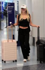 OLIVIA DUNNE Catches a Flight Out of LAX 03/10/2026