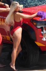OLIVIA DUNNE in a Red Swimsuit Filming Baywatch in Malibu 03/19/2026