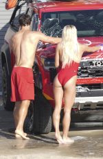 OLIVIA DUNNE in a Red Swimsuit Filming Baywatch in Malibu 03/19/2026