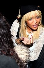 RIHANNA Greets and Chats with Fans as She Steps Out of Her London Hotel 02/24/2012