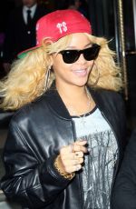 RIHANNA Leaves Her London Hotel and Posing with Fans 02/18/2012