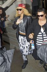 RIHANNA Leaves Her London Hotel and Posing with Fans 02/18/2012