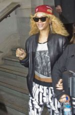 RIHANNA Leaves Her London Hotel and Posing with Fans 02/18/2012