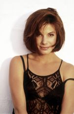 SANDRA BULLOCK at a Photoshoot 1995