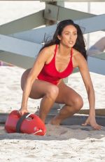 SHAY MITCHELL in a Red Swimsuit on the Set of New Baywatch Reboot in Los Angeles 03/18/2026