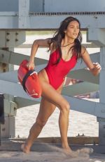 SHAY MITCHELL in a Red Swimsuit on the Set of New Baywatch Reboot in Los Angeles 03/18/2026