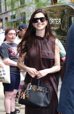 ANNE HATHAWAY Leaves Her Hotel in New York City 04/17/2026