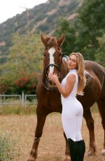 HELOISE HUTHART at a Photoshoot 04/25/2026