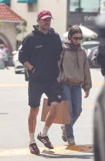 LILY COLLINS Out Shopping at Brentwood Country Mart in Los Angeles 04/13/2026