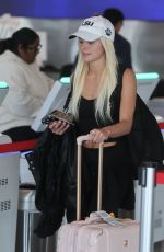 OLIVIA DUNNE Catching a Flight Out of LAX 04/23/2026