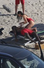 SHAY MITCHELL in a Red Swimsuit Films Scenes for Baywatch Reboot at Leo Carrillo Beach in Malibu 04/08/2026