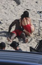 SHAY MITCHELL in a Red Swimsuit Films Scenes for Baywatch Reboot at Leo Carrillo Beach in Malibu 04/08/2026