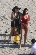 SHAY MITCHELL in a Red Swimsuit Films Scenes for Baywatch Reboot at Leo Carrillo Beach in Malibu 04/08/2026