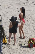 SHAY MITCHELL in a Red Swimsuit Films Scenes for Baywatch Reboot at Leo Carrillo Beach in Malibu 04/08/2026