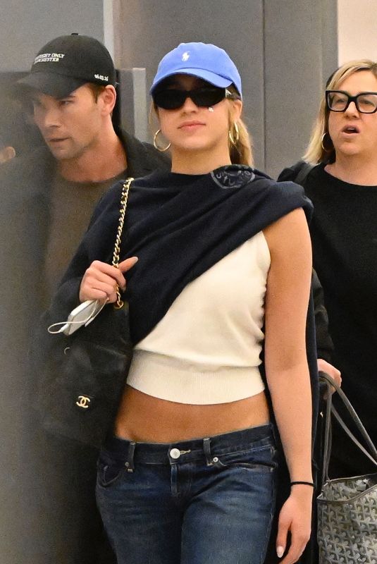 TATE MCRAE Arrives at Miami International Airport 04/07/2026