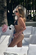 TATE MCRAE in Bikini at a Pool in Miami 04/12/2026