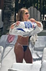 TATE MCRAE in Bikini at a Pool in Miami 04/12/2026