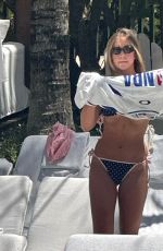 TATE MCRAE in Bikini at a Pool in Miami 04/12/2026