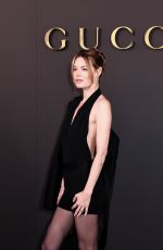 CAMILLE ROWE at GUCCI Cruise 2027 Fashion Show at Times Square in New York City 05/16/2026
