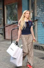 EMMA ROBERTS Filming a Commercial for Adidas x Nordstrom in Chinatown in New York City 05/06/2026