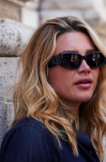 FLORENCE PUGH at a Seof of a Photoshoot for Max Mara in Rome 04/29/2026