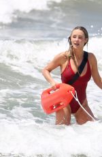 HASSIE HARRISON ina Red Swimsuit Film Scenes for Baywatch Reboot in Los Angeles 05/05/2026