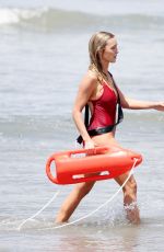 HASSIE HARRISON ina Red Swimsuit Film Scenes for Baywatch Reboot in Los Angeles 05/05/2026