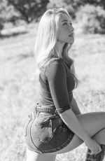 HELOISE HUTHART at a Photoshoot 04/08/2026