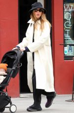 JENNIFER LAWRENCE Dons a Trenchcoat for a Stroller Stroll in New York City 04/30/2026